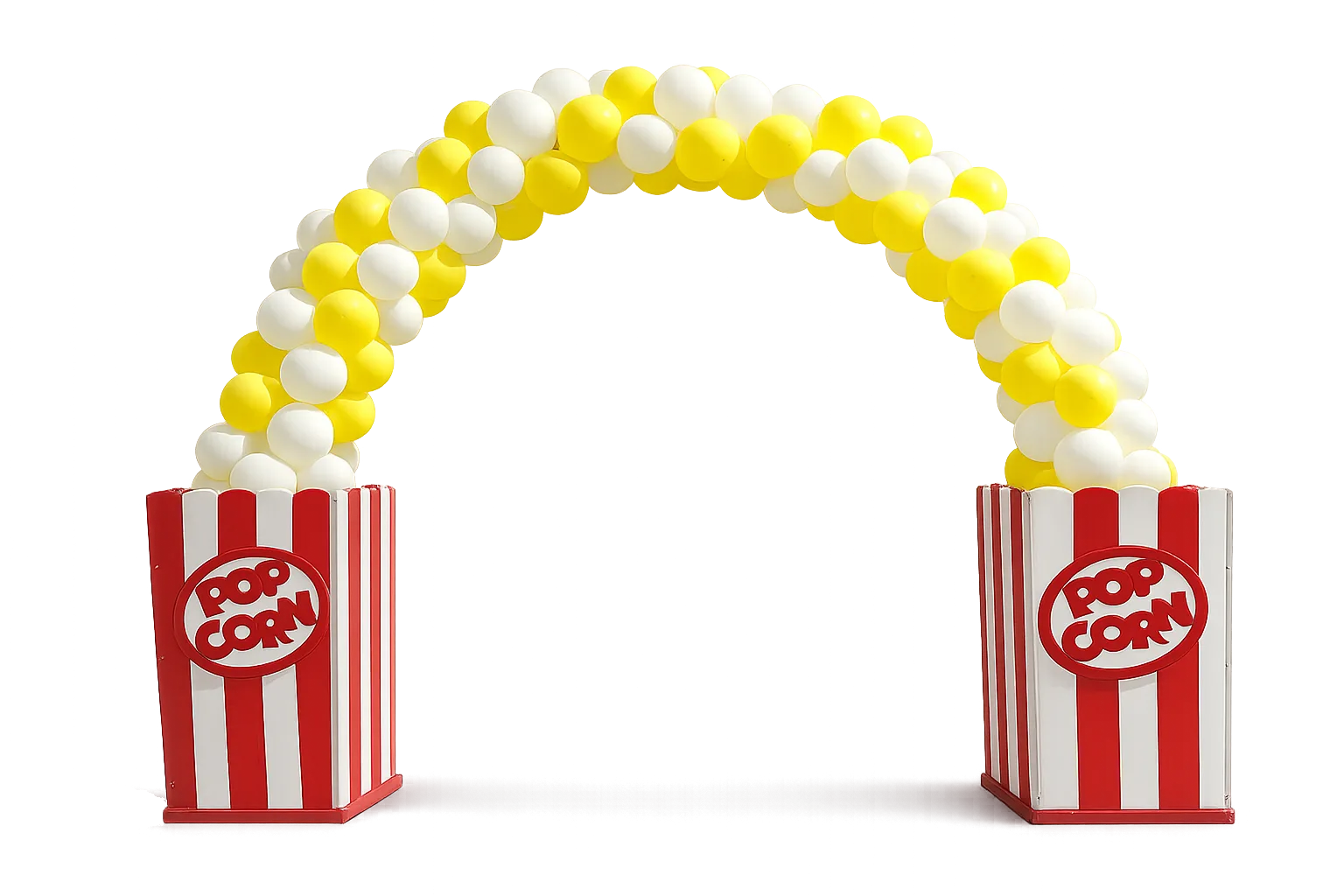 A coordinated balloon garland mounted along a backdrop wall, with a photo backdrop and styled prize table staged in front